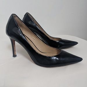Coach black patent pumps